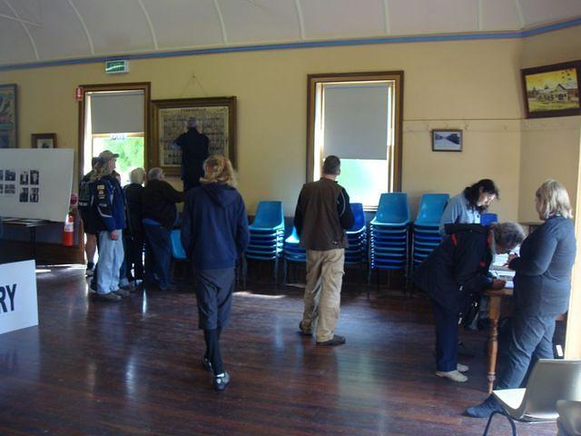 Tarnagulla History Day, 
   Victoria Theatre, Tarnagulla
       30 September 2012.
Des Akers taking close-ups of the Old Pioneers, supported by Richard Shiell.
     David Gordon Collection.