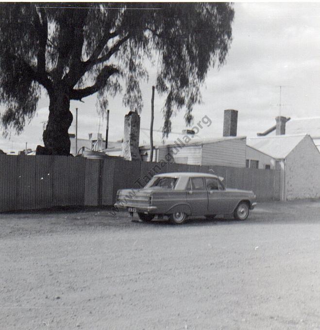 Geoffrey O’Shea’s HD Holden at rear of Fred Williams Butcher’s Shop in Tarnagulla c1966