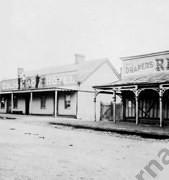 Golden Age Hotel receiving a coat of paint, c.1925.